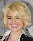 Kelly Osbourne's short above the collar hair with curls