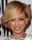 Keri Hilson wearing her hair short with rounded styling