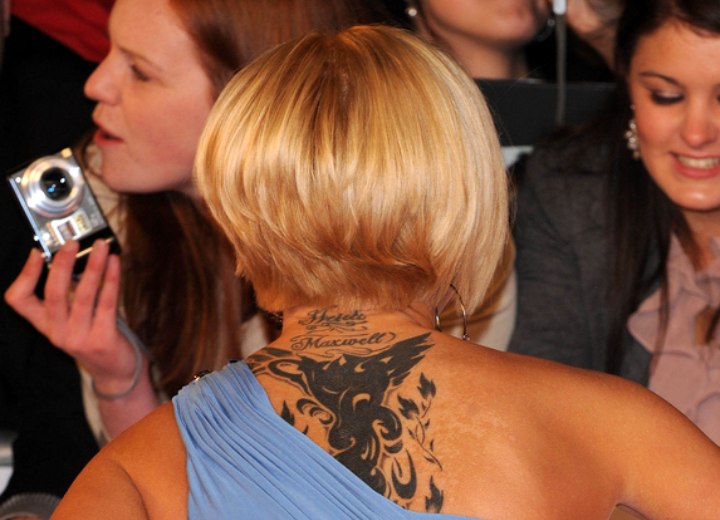 Kerry Katona with her hair cut short in the nape