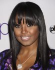 Keshia Knight Pulliam with her black hair in a long style with choppy ends