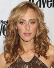 Kim Raver with tousled curls