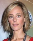Kim Raver with her hair cut in a bob with textured ends