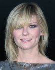 Kirsten Dunst wearing a shoulder length haircut with textured ends