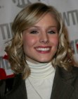 Kristen Bell's medium length hair with curls and waves that frame her face