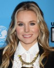 Kristen Bell's long blonde hair with highlights and barrel curls