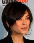 Kristin Kreuk wearing her hair below the collar line short