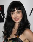 Krysten Ritter's long blue black hair with short bangs