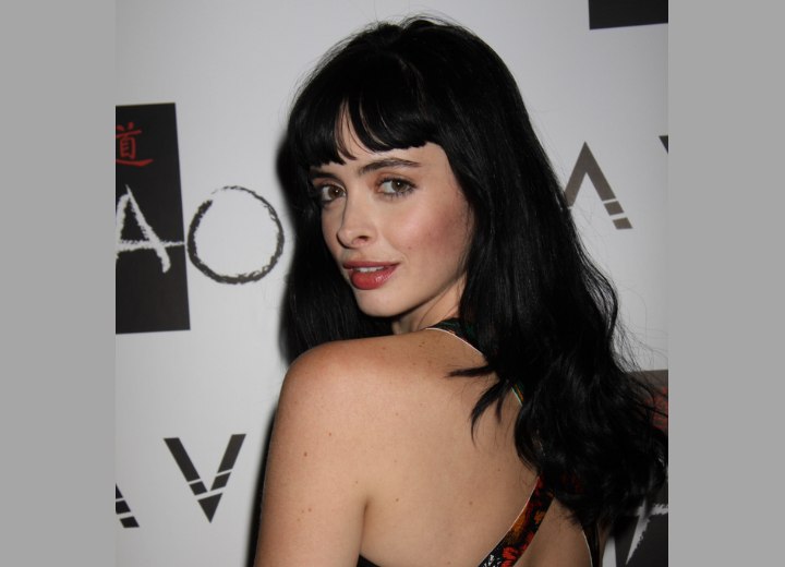 Krysten Ritter with long blue black hair