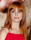 Lauren Ambrose wearing her long red hair smooth and silky