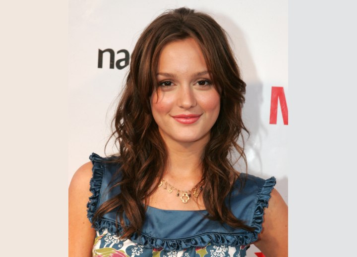 Leighton Meester wearing her hair long with barrel curls