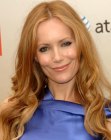 Leslie Mann's chest-length blonde hair with layers and loose curls