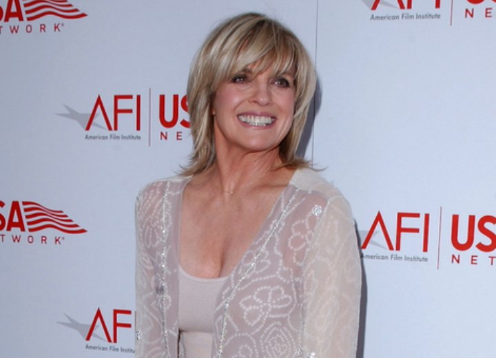 Linda Gray wearing a scoop-neck beaded gown