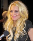 Blonde Lindsay Lohan with long curled hair