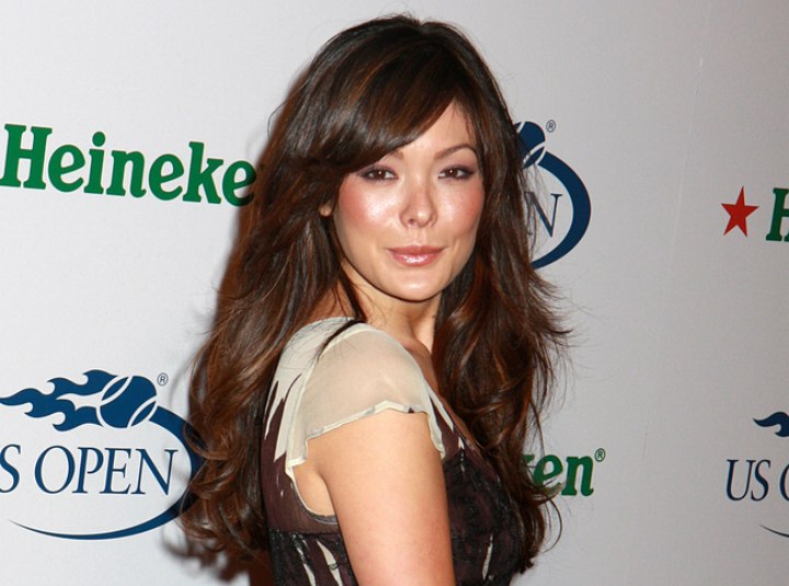 Lindsay Price with long thick hair