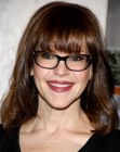 Lisa Loeb wearing shoulder length hair with bangs