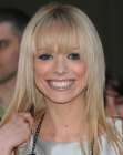 Liz McClarnon sporting fluffy long hair with bangs