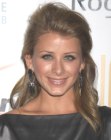 Lo Bosworth wearing a grey satin dress