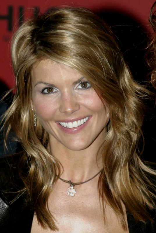 Lori Loughlin | Long hairstyle with layers cut thoughout the hair