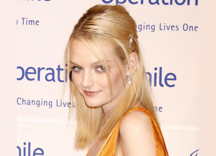 Lydia Hearst wearing a long straight hairstyle