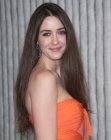 Madeline Zima's very long hairstyle with an angled middle part