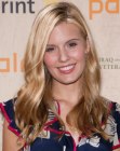 Maggie Grace wearing her long blonde hair with a high side part