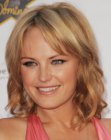 Malin Akerman wearing a medium length hairdo with layers