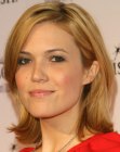 Mandy Moore sporting a simple medium length hairstyle with layers