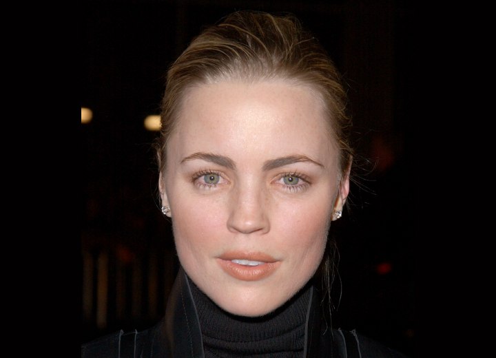 Melissa George wearing a black turtleneck