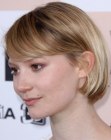 Mia Wasikowska sporting a jaw length bob cut with a side part