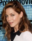 Michelle Monaghan with her hair tucked behind her ear