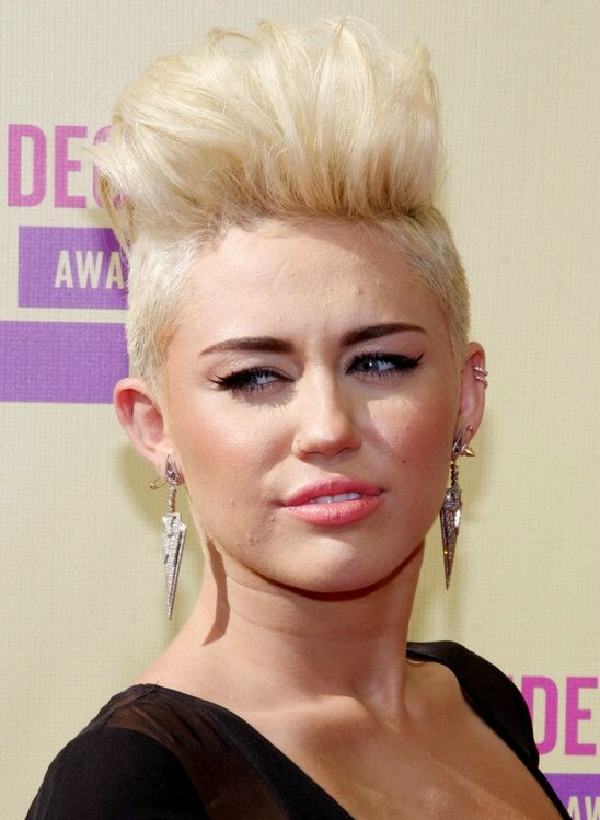 Miley Cyrus with very short hair  Buzzed sides