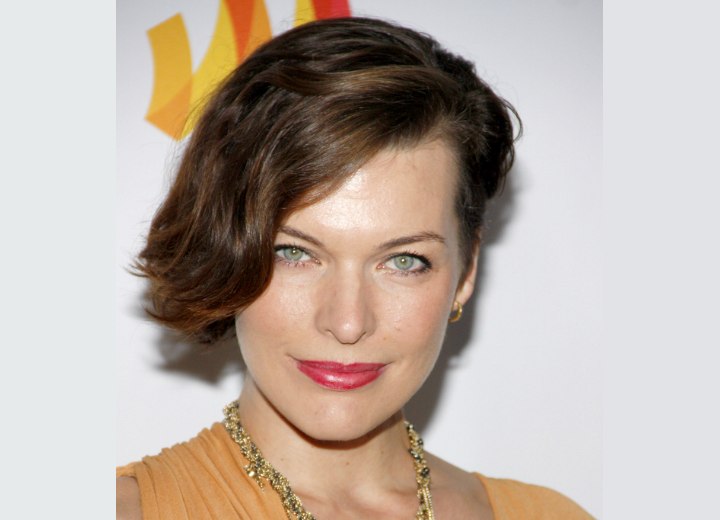 Milla Jovovich wearing a bob with one side styled to the back
