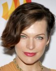 Milla Jovovich with her hair in a short asymmetrical style
