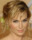 Molly Sims wearing her hair pulled back