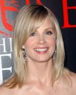 Monica Potter's long blonde hair with darker slices