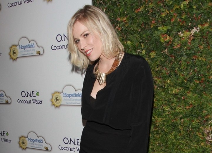 Natasha Bedingfield wearing a simple black dress