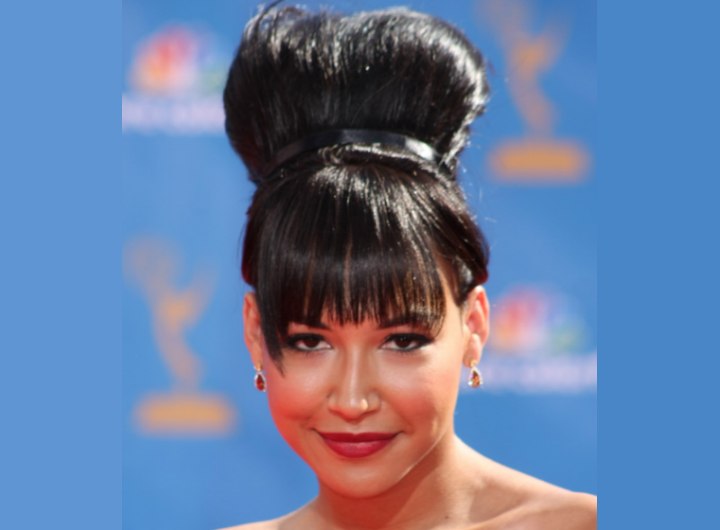 Naya Rivera with her hair up with a hair band