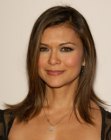 Nia Peeples sporting a long hairstyle with layers