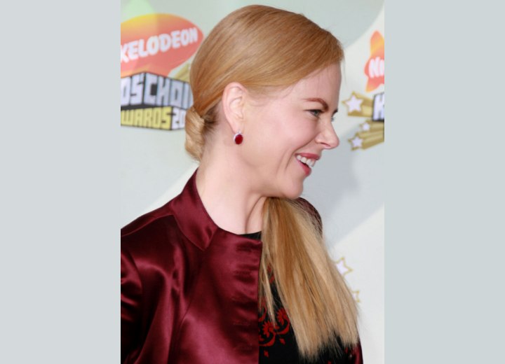 Long hair flowing over one shoulder - Nicole Kidman