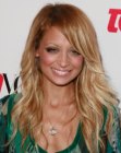 Nicole Richie's free spirited long hairstyle with layers