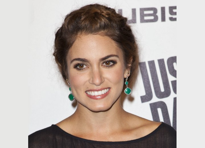 Nikki Reed with pinned braids