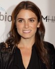 Nikki Reed wearing her hair very long with a hippie appearance