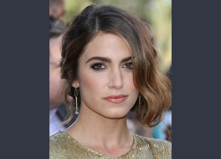 Nikki Reed sporting a festive hairstyle