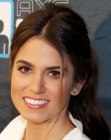 Nikki Reed wearing her hair in a ponytail