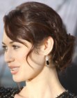 Olga Kurylenko 1940s updo with finger waved bangs and braiding