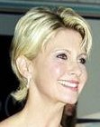 Olivia Newton John with short hair