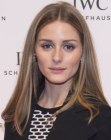 Olivia Palermo with her hair in a simple and easy to manage shoulder length style