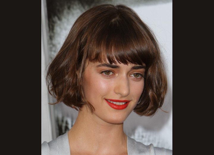 Olya Zueva wearing her hair in a short bob