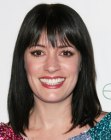 Paget Brewster with her hair in a sleek bob that rests upon her shoulders