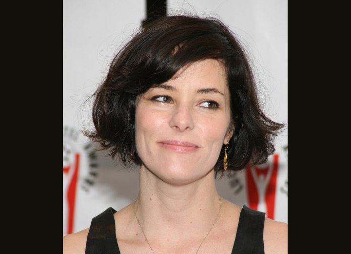 Parker Posey's short haircut with waving